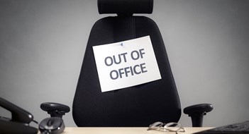 Business chair with out of office sign concept for vacation, holiday, lunch break or work life balance