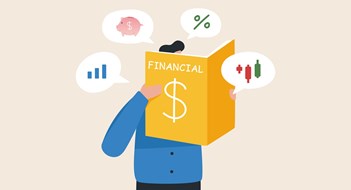 Financial Literacy  for Board Members Financial literacy and investment. Handbook of knowledge in money management. Stock market. A young man or businessman reading a financial manual.