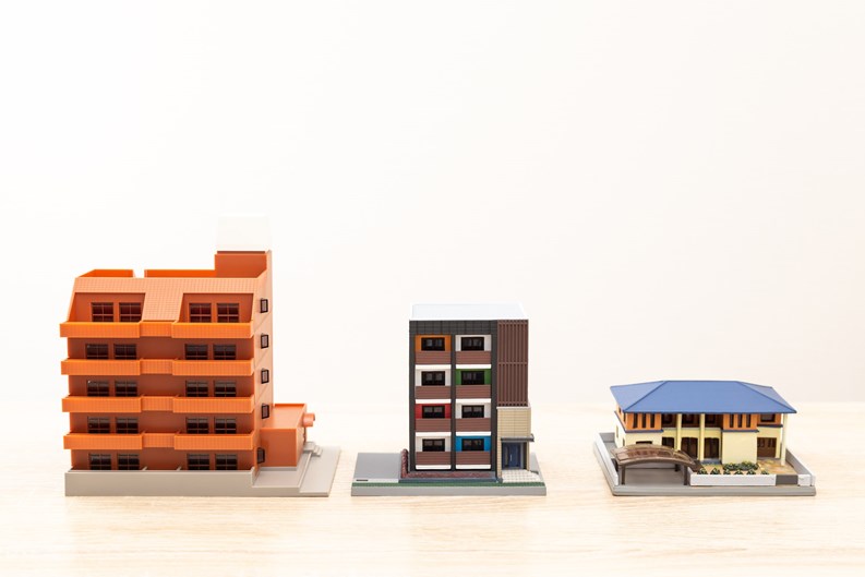 Model of a house placed on a desk