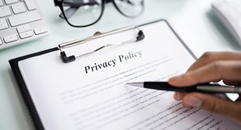 Dealing With Litigation Privacy Policy Notice And Legal Agreement. Man Reading Contract