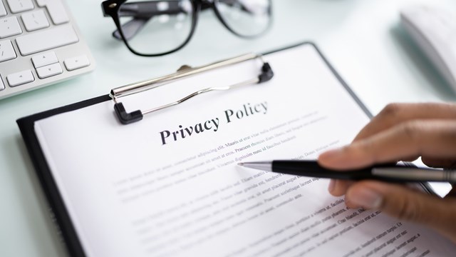 Privacy Policy Notice And Legal Agreement. Man Reading Contract