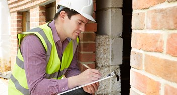 Exterior Safety Inspections Architect Checking Insulation During House Construction