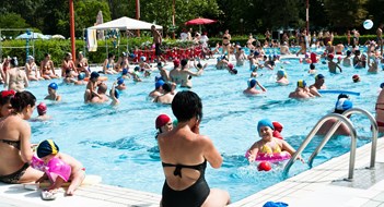 Q&A: Summertime Blues "Bologna, Italy - July 1, 2012: Adulta and families with children refreshing themself and having fun in a crowded swimming pool near Bologna (Italy). It's a sunny day, during a very hot summer."