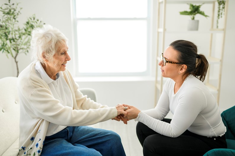 A old woman thinking with psychologist in consultation office for mind, evaluation or assessment.